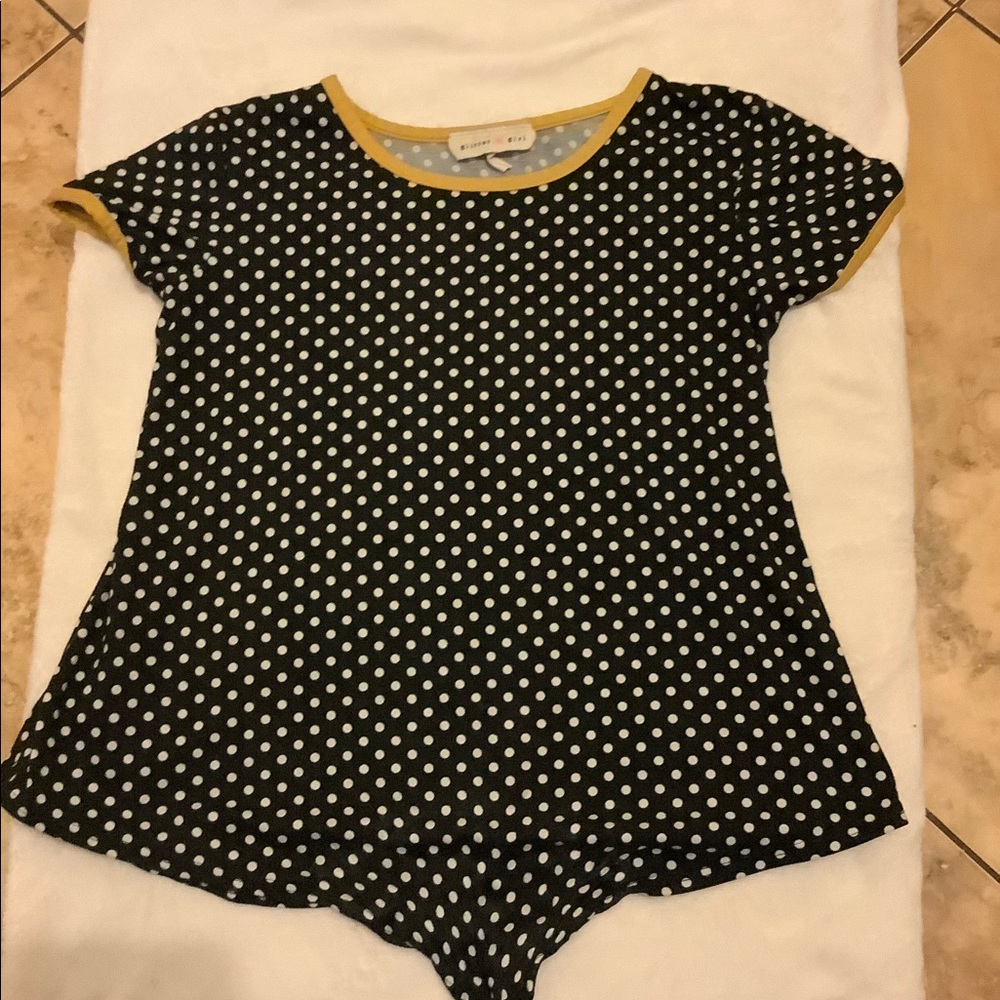 White and black poka dot with yellow at the sleeve